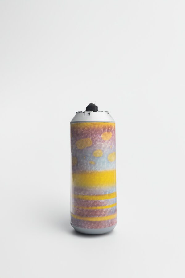 A can of paint on top of a white surface.