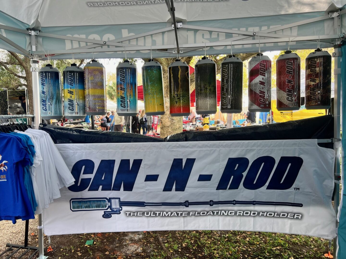 A can-n-rod tent with many cans hanging from the side.