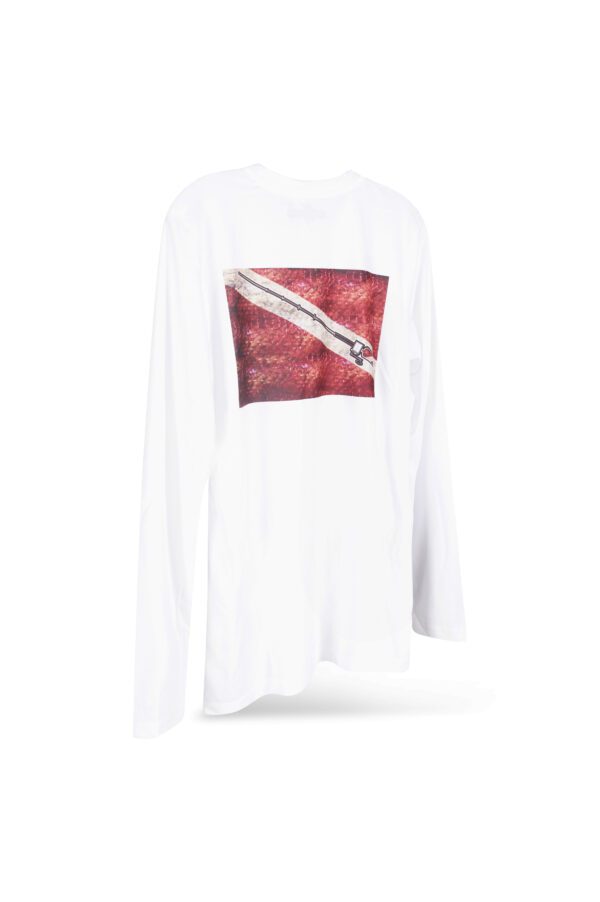 A white long-sleeved t-shirt with a graphic print of a pencil on a textured red background, displayed against a white backdrop.